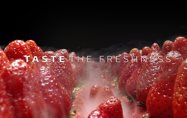 Jordbær og teksten ”Taste the Freshness.”