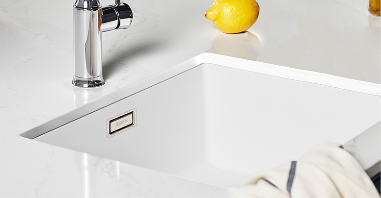 Bunnlimt vask En bunnlimt vask i Quartz-benkeplate