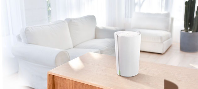 Mesh senker ikke farten på WiFi Deco X90 på et bord