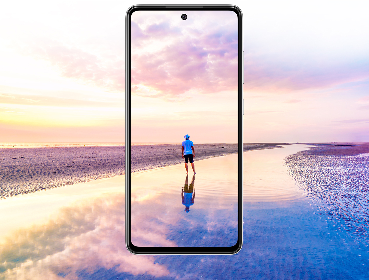 Samsung Galaxy A52 er alltid tilgjengelig Samsung Galaxy A52 5G og en mann på en strand i solnedgangen