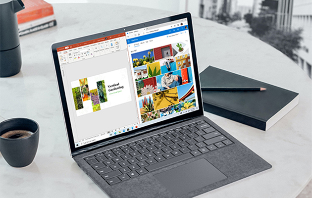 Realiser dine idéer Windows-PC på et bord med en kaffekopp