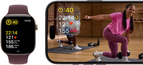 Apple Watch ved siden av en iPhone med en Apple Fitness+-økt på skjermen.