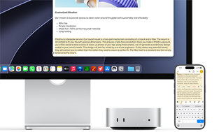 Mac mini vist forfra, plassert under Studio Display. En iPhone står til høyre for Mac mini og skjermen. Tekst markeres med kommandoene klipp ut, kopier, lim inn og autoutfyll øverst på iPhone, som samsvarer med den markerte teksten på skjermen. Universelle utklipp brukes.