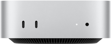 Mac mini i sølv vist forfra, med to USB-C-porter, av/på-knapp, statuslys og ventilasjonsgrill nederst