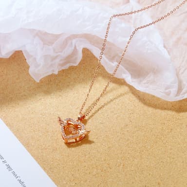 Hjertevinger halskjede Rose gull