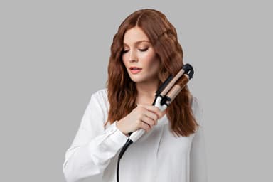Remington PROLuxe 4-i-1 justerbar krølltang CI91AW
