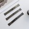 Tofarget armbånd til Samsung og Huaweis smartklokker 20 mm - sort / sølv