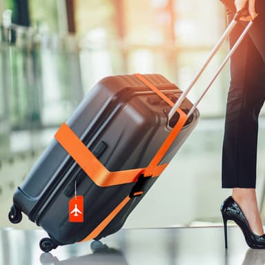 Bagasjerem med adresseetikett Oransje
