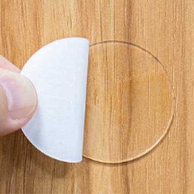 Runde dobbeltsidige klistremerker laget av nanotape Gjennomsiktig