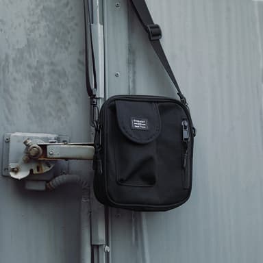 Lett crossbody-taske for menn 18x15x5 cm