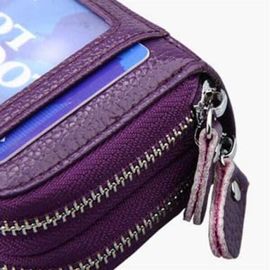 Svart lommebok i okseskinn med RFID-beskyttelse og mange praktiske rom