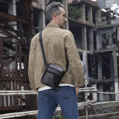 Crossbody-veske i ekte skinn Sort