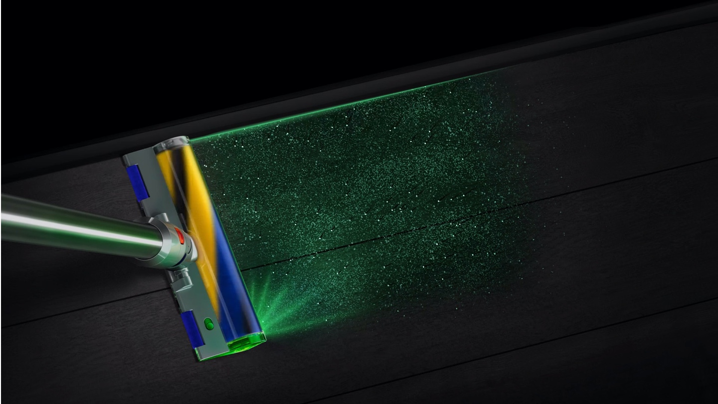 Dyson V15 støvsuger et gulv med grønt lys som viser alle partiklene
