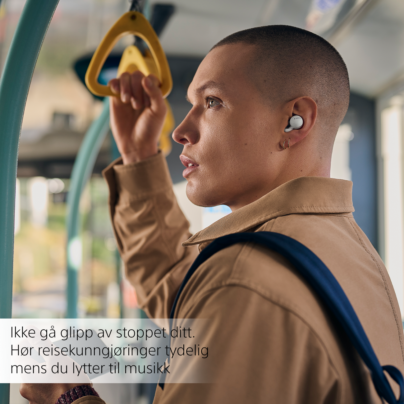 Person on a bus with Sony LinkBuds