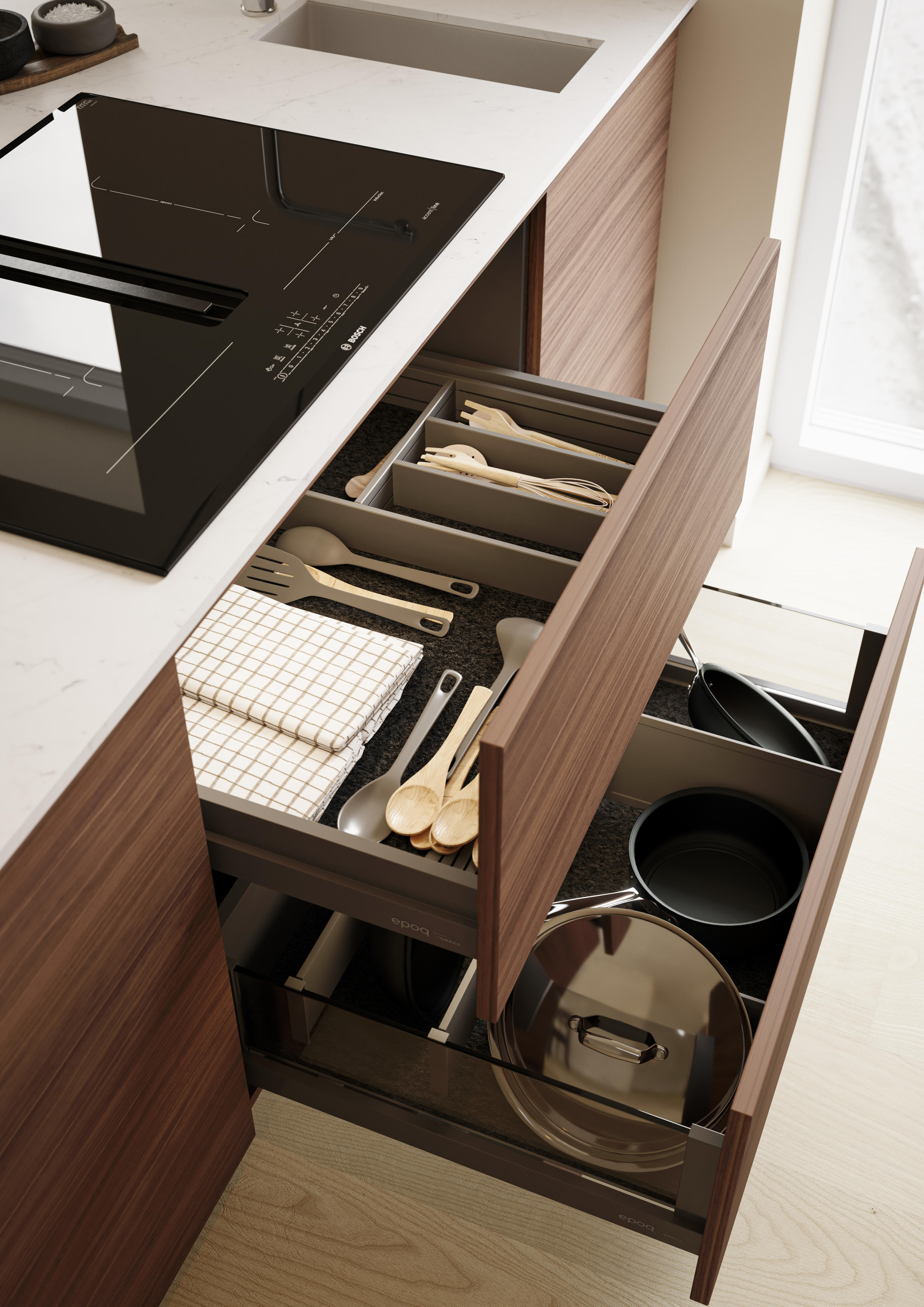 Epoq Edge Walnut & Trend Warm White med åpne, velorganiserte skuffer under platetopp