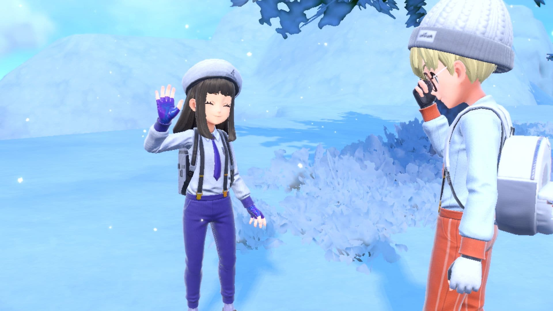 To karaktereri vinterlandskap fra spillet Pokémon Scarlet / Pokémon Violet