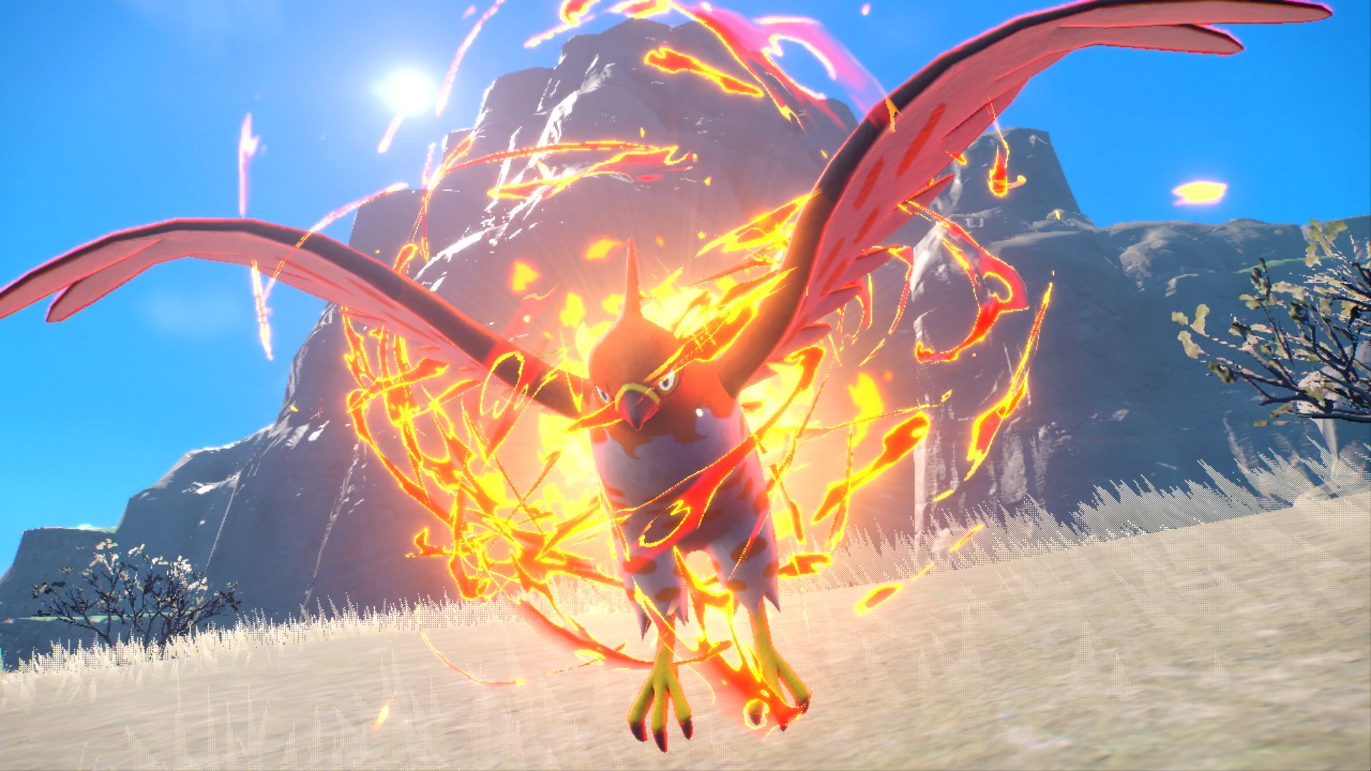 Stor rød fugl med flammer rundt fra Pokémon Scarlet / Pokémon Violet-spillet