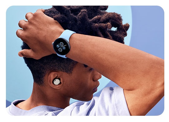 Man with Pixel Buds and Pixel Watch 2