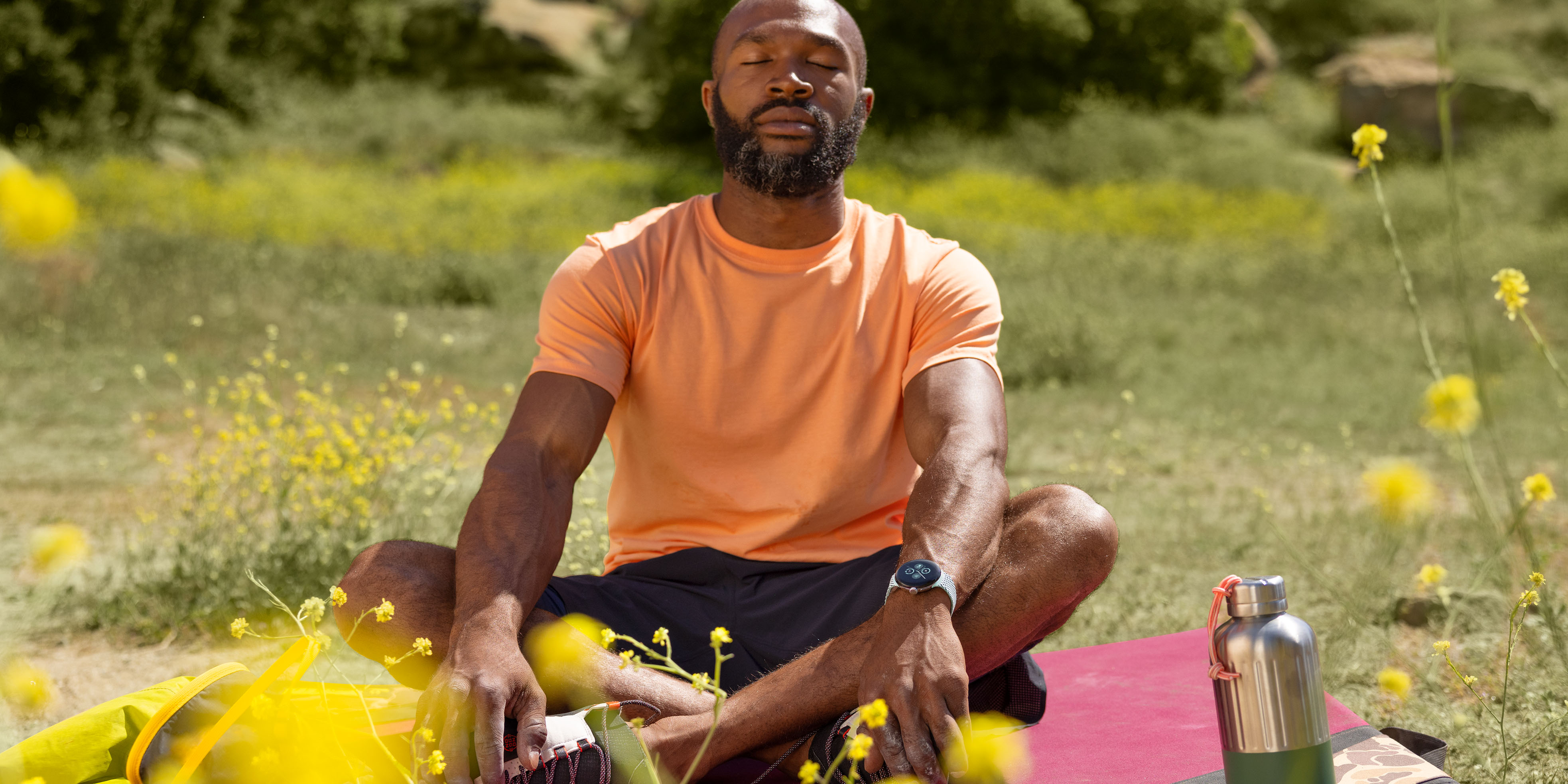 Man meditating with Google Pixel Watch 2