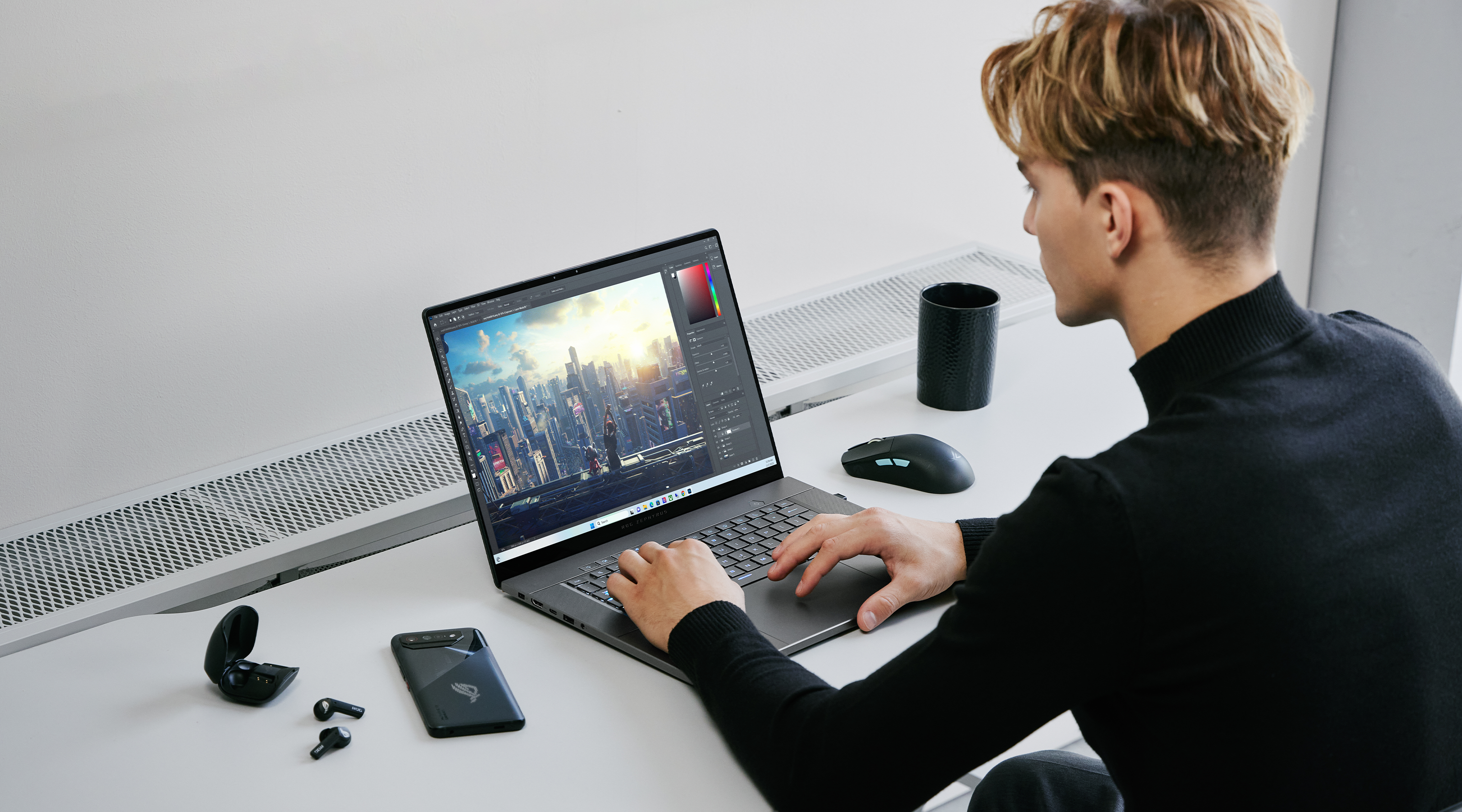 Asus - Gaming - En mann med Asus ROG Zephyrus G14 G16 gaming-PC