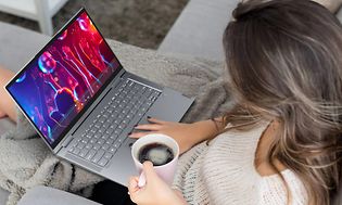 Woman with Lenovo Yoga 7i
