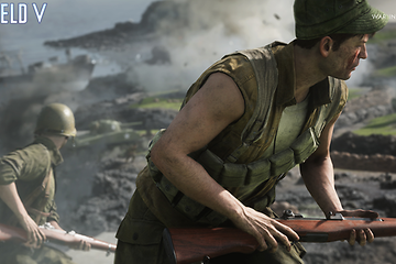 Battlefield V - to soldater med gevær på en slagmark