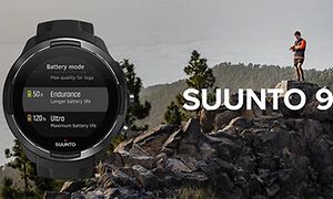 Suunto 9 med en mann på en fjelltopp i bakgrunnen