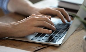 Person working on a laptop