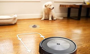 iRobot i en stue med illustrasjon av avstandskontroll