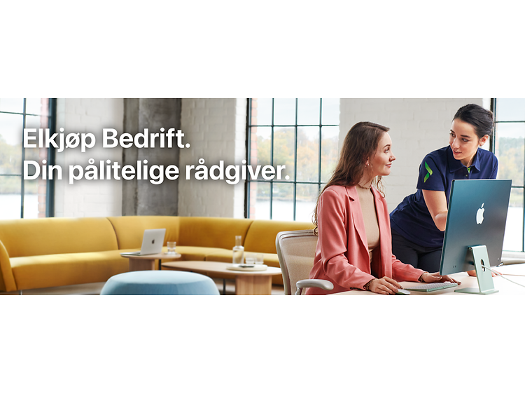 Female Elkjøp employee helping a woman with her iMac and text with trusted advisor