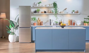 Samsung fridge freezer in a blue kitchen