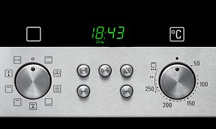 Symboler på fronten av en stekeovn