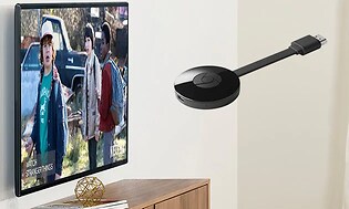 Google Home - Chromecast og TV på en vegg