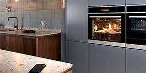 MDA-Stekeovn-Electrolux innebygd stekeovn i et integrert moderne kjøkken