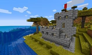 Et lite slott ved et vann i Minecraft