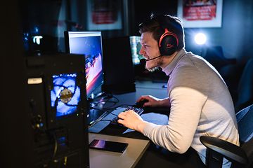 Man playing on a desktop gaming pc