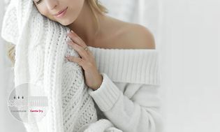 Woman showing how soft her blanket is