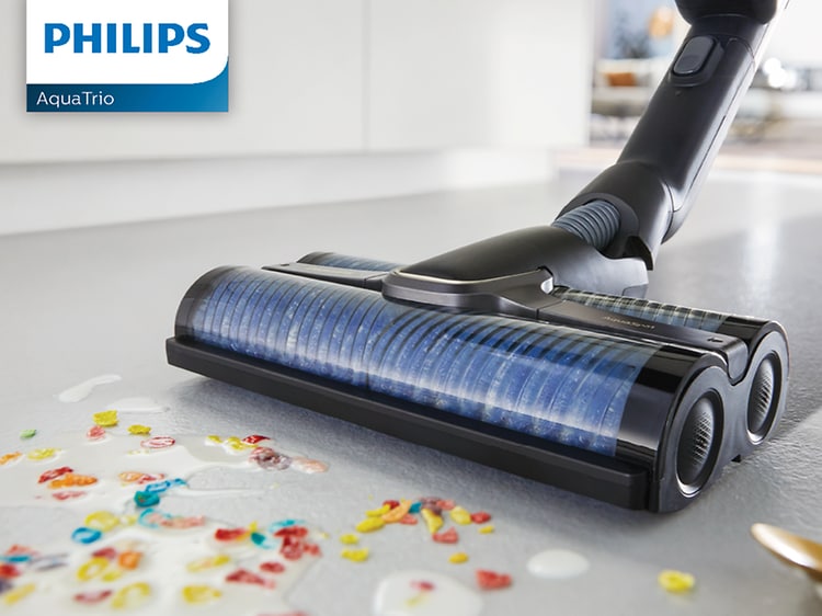 Philips AquaTrio cordless vacuum cleaning the floor