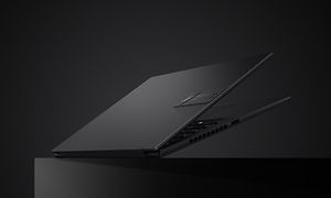 Vivobook S14 OLED - Black laptop slightly opened