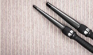 Two curling irons on a striped background