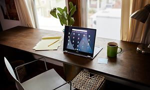 Google - Chromebook - Acer Spin with a flipped screen showing the desktop on top of a desk