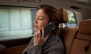 Woman with Pixel phone in car