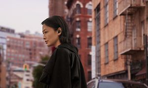 Woman on street with Pixel Buds