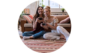 CS-Gaming insurance- Two young women playing video games