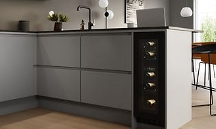 MDA - Wine cooler - A narrow wine cooler integrated to the end of a kitchen counter