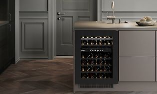 A wine cooler integrated into a grey colored Epoq kitchen