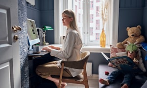 B2B - Make your home office more efficient - A mother and her son in a home office environment