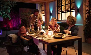 People eating outdoor in garden area