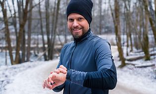 Man outside with Polar watch