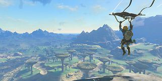 Skjermdump fra spillet The Legend of Zelda: Tears of the Kingdom med Link som paraglider